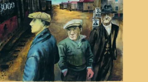 three men by a train car